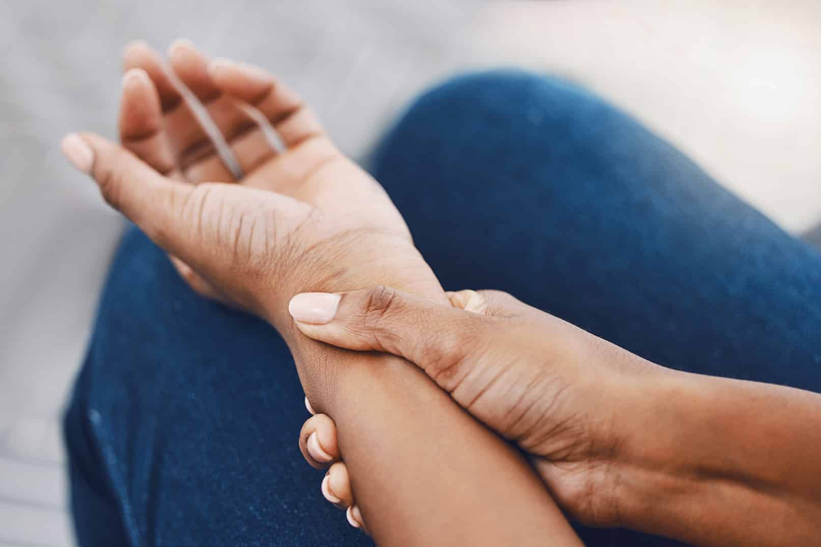 patient at dermatologist with a foreign object in her hand